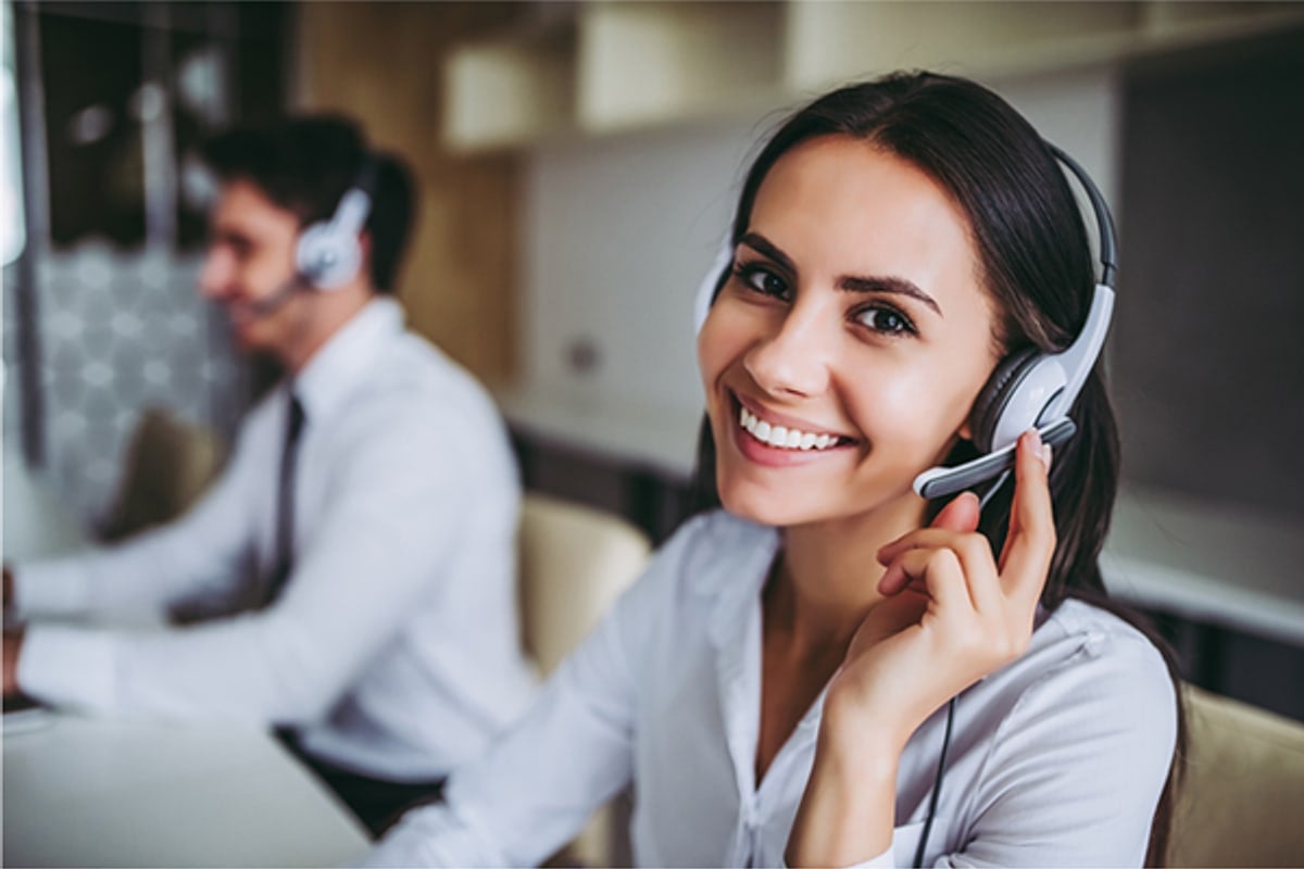 A Focus Interpreting team member wearing a headset during a live remote interpreting session